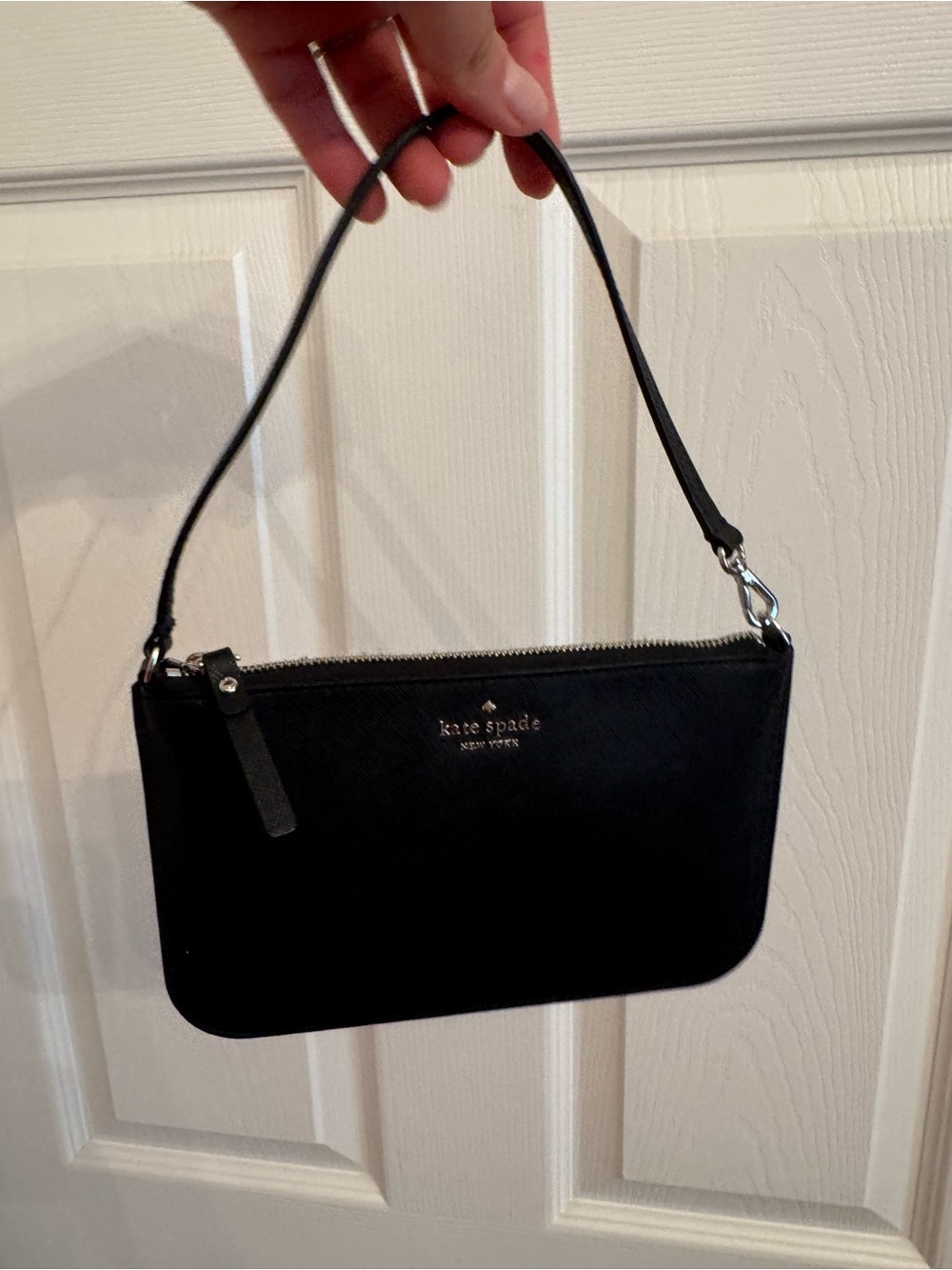 Kate Spade black wristlet mini bag
